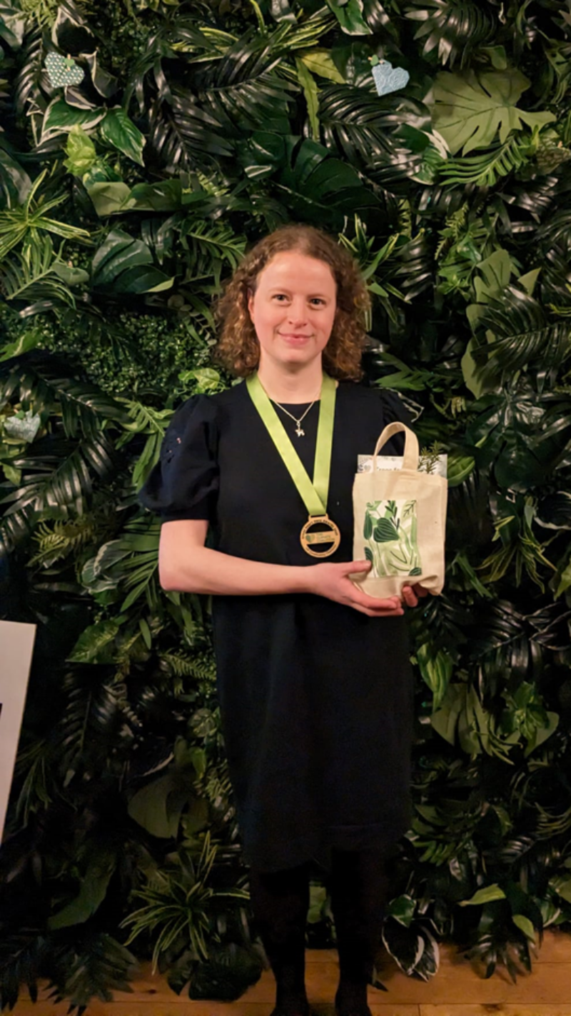 Olivia with her award.
